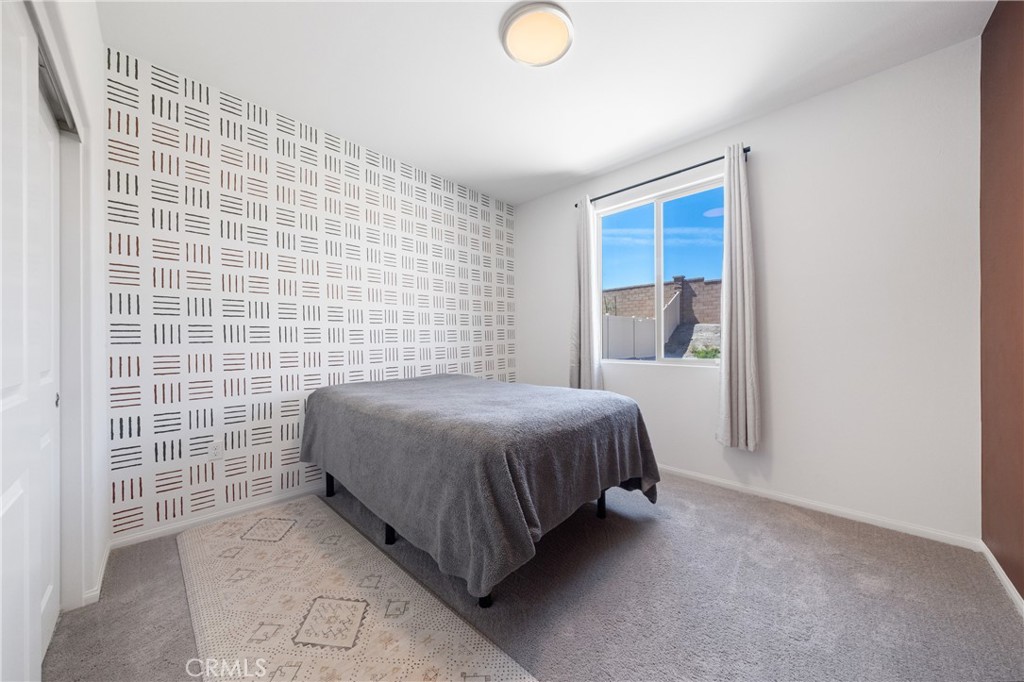 27059 Indigo Bush Road Menifee, CA 92586 - Photo 18 of 39 Primary Floor Bedroom With Natural Light And Clean Finishes