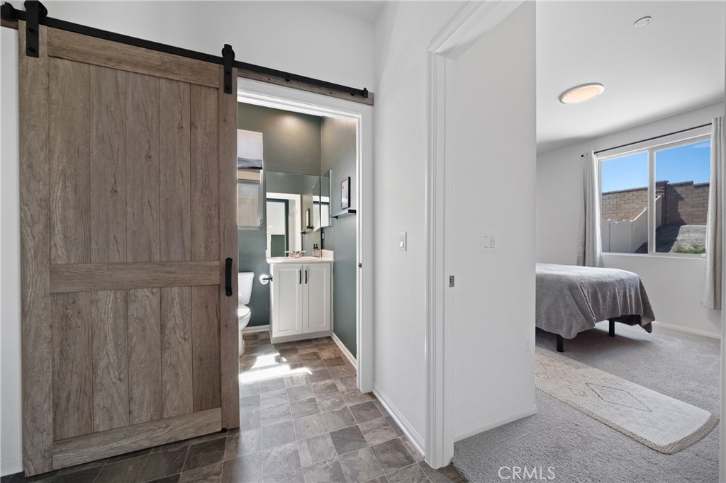 27059 Indigo Bush Road Menifee, CA 92586 - Photo 20 of 39 Primary Floor Bed And Bathroom