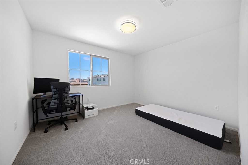 27059 Indigo Bush Road Menifee, CA 92586 - Photo 24 of 39 Versatile Upstairs Room Ideal For Office, Gym, Or Guest Space