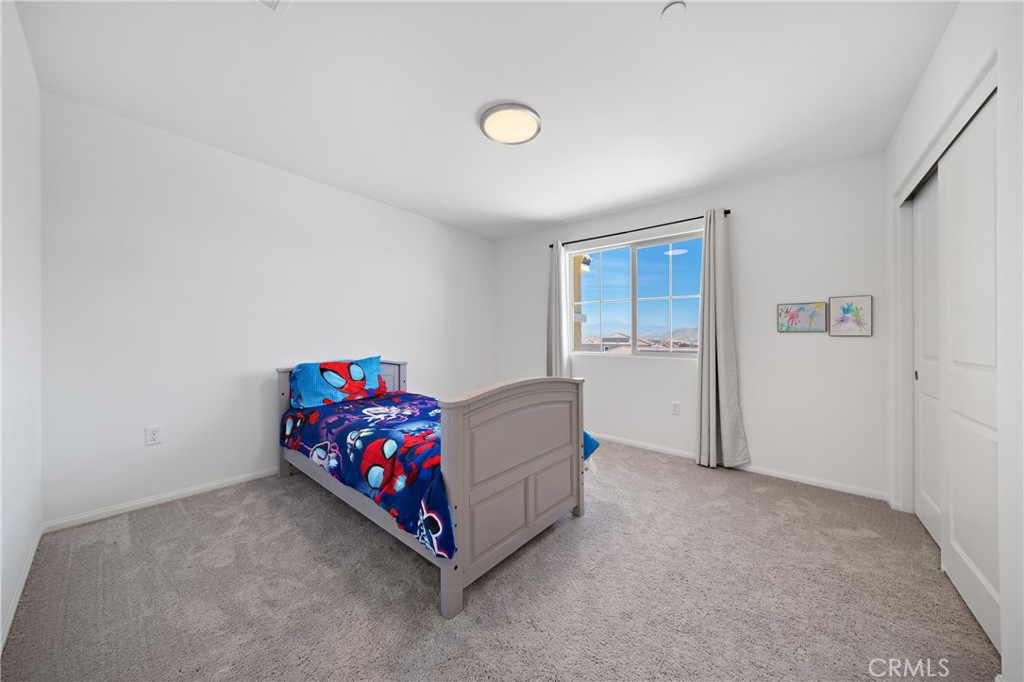 27059 Indigo Bush Road Menifee, CA 92586 - Photo 26 of 39 Bedroom With Neutral Finishes And Natural Light