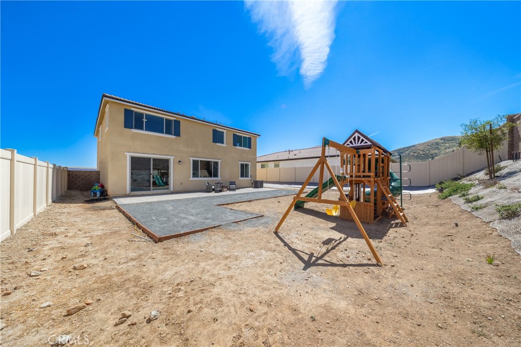 27059 Indigo Bush Road Menifee, CA 92586 - Photo 32 of 39 Backyard With Ample Space For Outdoor Seating And Play