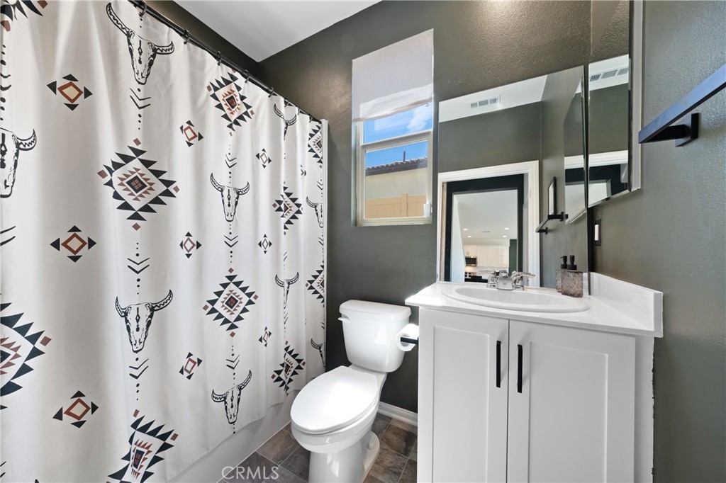27059 Indigo Bush Road Menifee, CA 92586 - Photo 10 of 39 Primary Floor Bathroom With Shower/Tub Combo And Updated Vanity