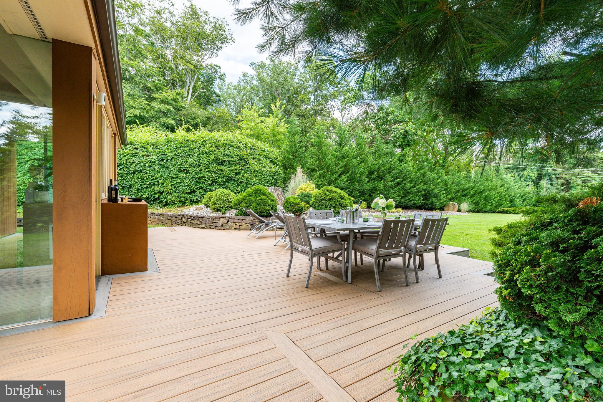 411 Clairemont Road Villanova, PA 19085 - Photo 57 of 76 a view of a table and chairs in patio of the house