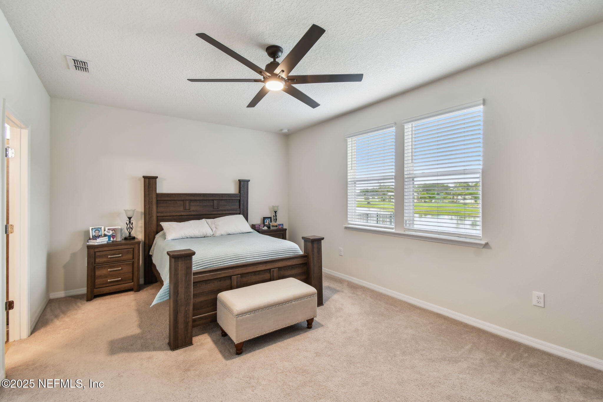 182 Myrtle Oak Court St. Augustine, FL 32092 - Photo 23 of 81 a bedroom with a bed and window