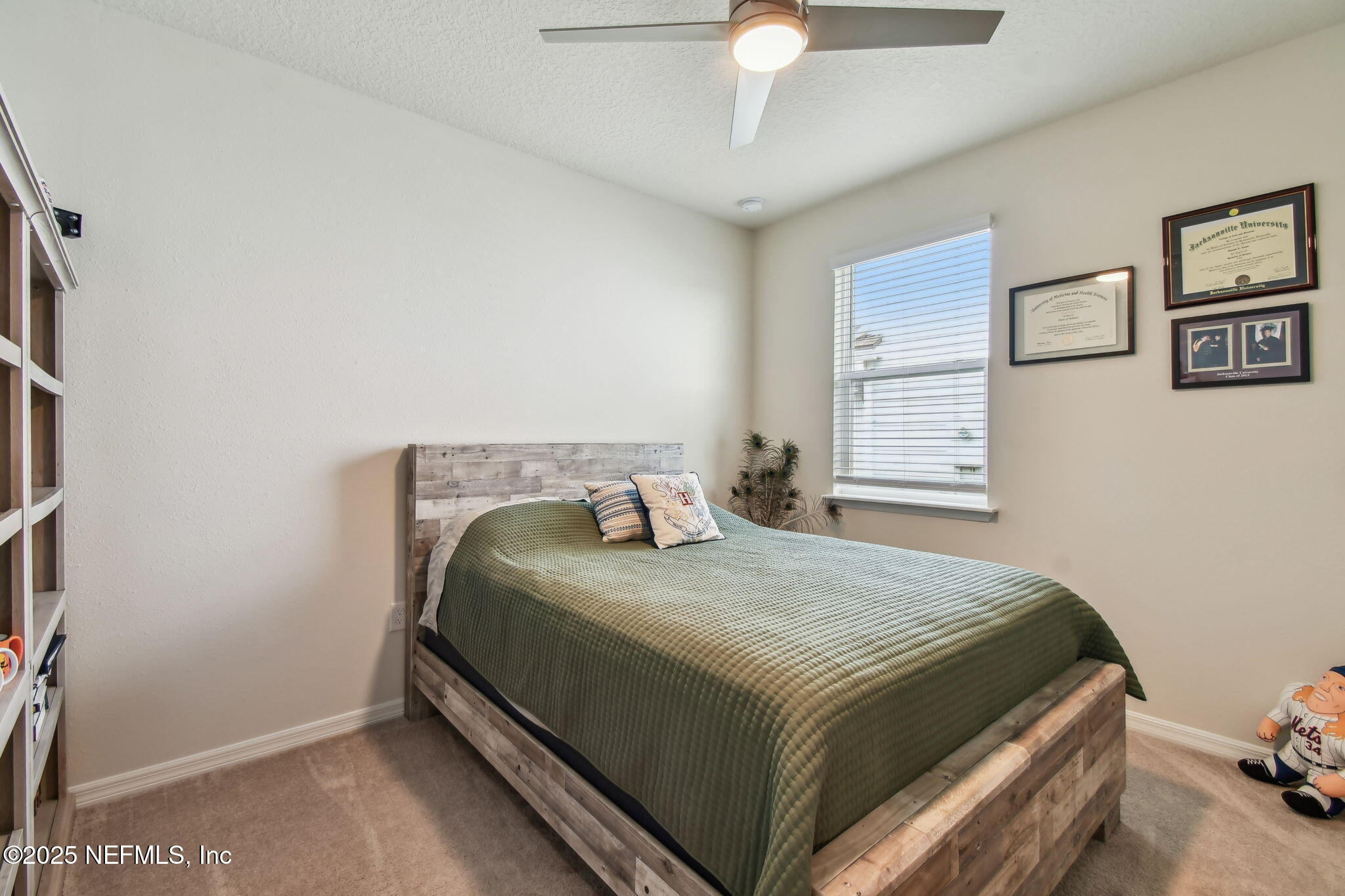 182 Myrtle Oak Court St. Augustine, FL 32092 - Photo 28 of 81 a bedroom with a bed and a window