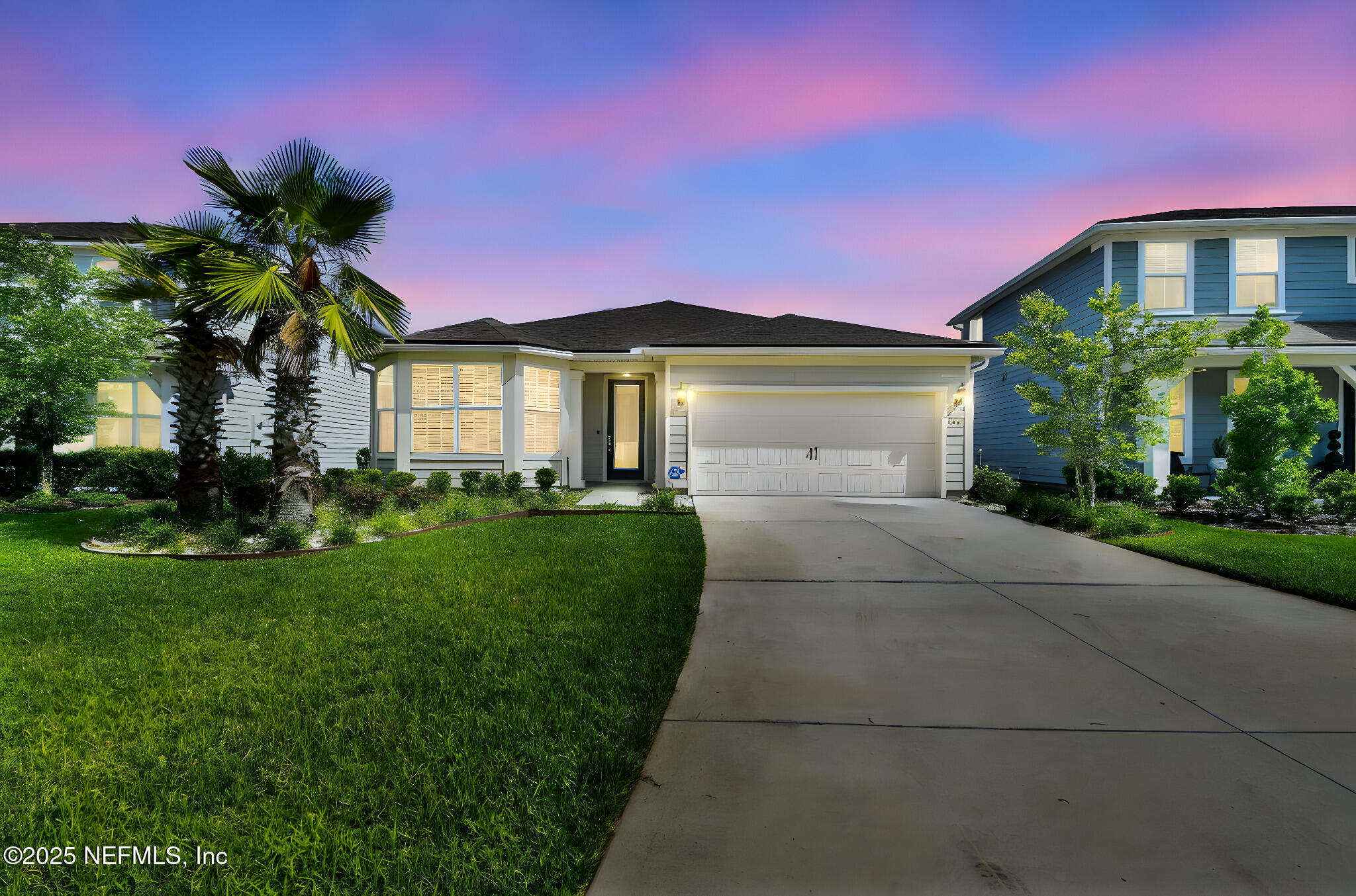 182 Myrtle Oak Court St. Augustine, FL 32092 - Photo 3 of 81 a front view of a house with a yard and garage