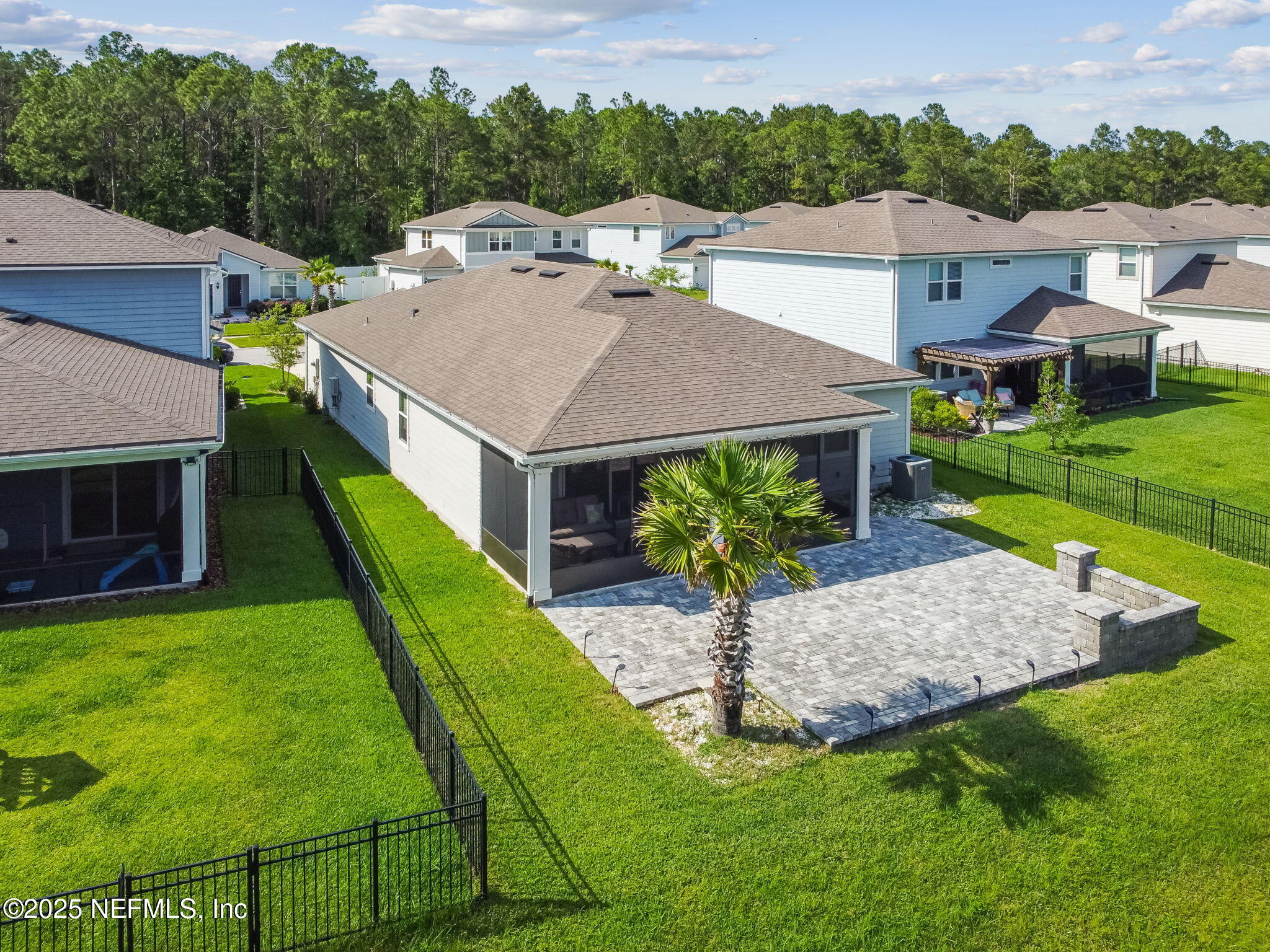 182 Myrtle Oak Court St. Augustine, FL 32092 - Photo 47 of 81 a aerial view of a house with swimming pool and a yard
