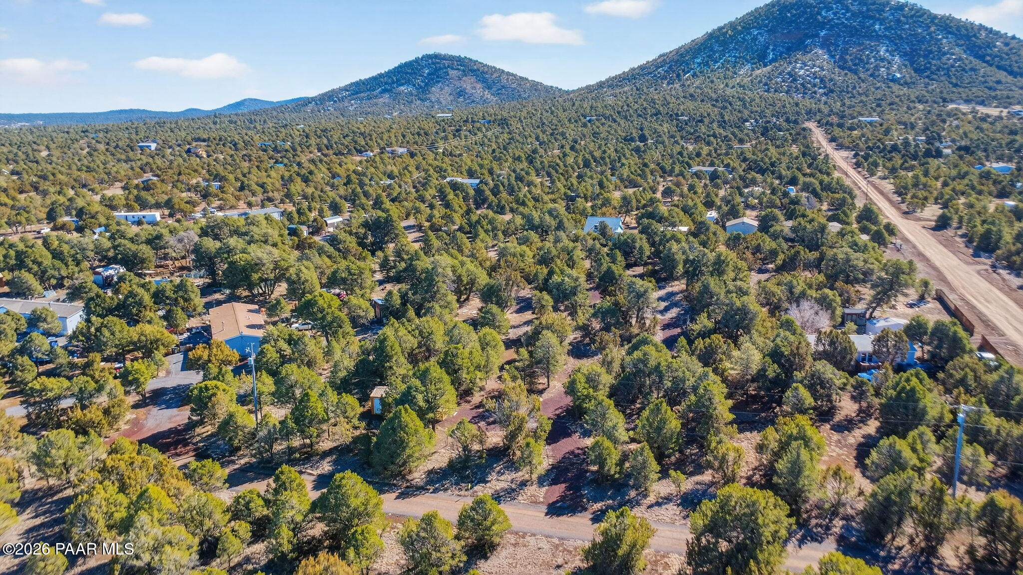 1302 East Bluebell Street Williams, AZ 86046 - Photo 4 of 12 a view of a city with a mountain in the background