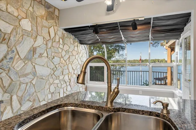 a close view of a sink and table in the outdoor