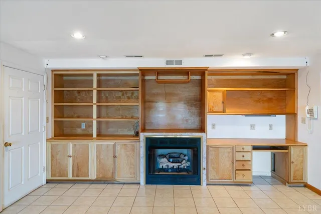 a view of porch with wooden floor