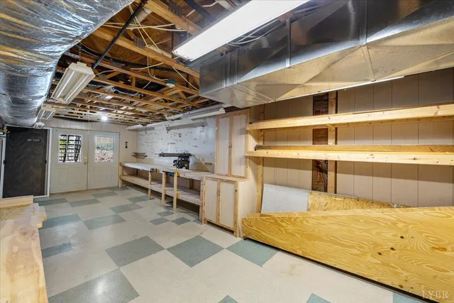 a view of a lake with houses in front of it