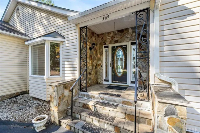 a front view of a house with a porch