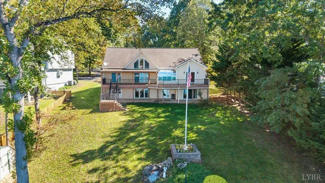 a picture of a kitchen with a white refrigerator