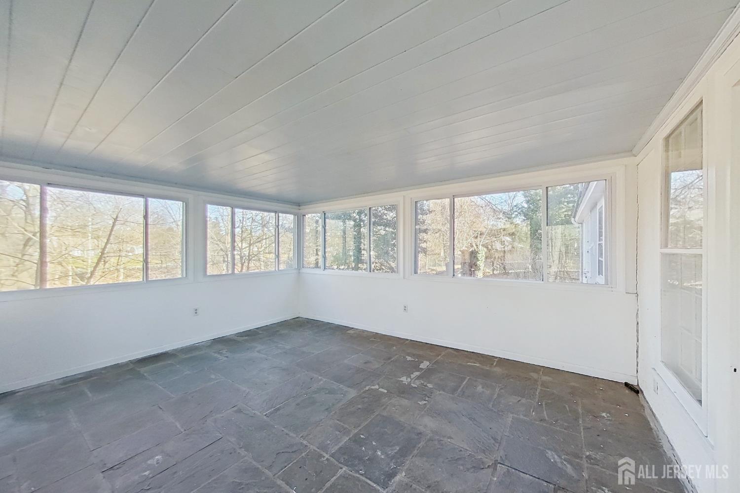 205 Ashland Road Middlesex, NJ 08846 - Photo 19 of 48 an empty room with windows