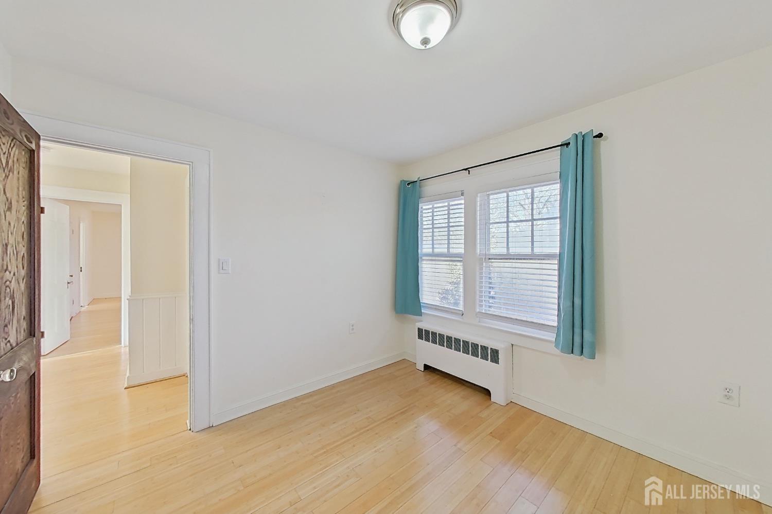 205 Ashland Road Middlesex, NJ 08846 - Photo 24 of 48 a view of an empty room with a window