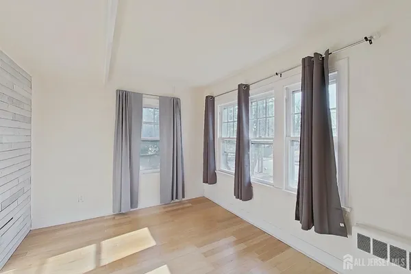 a view of a room with an entryway