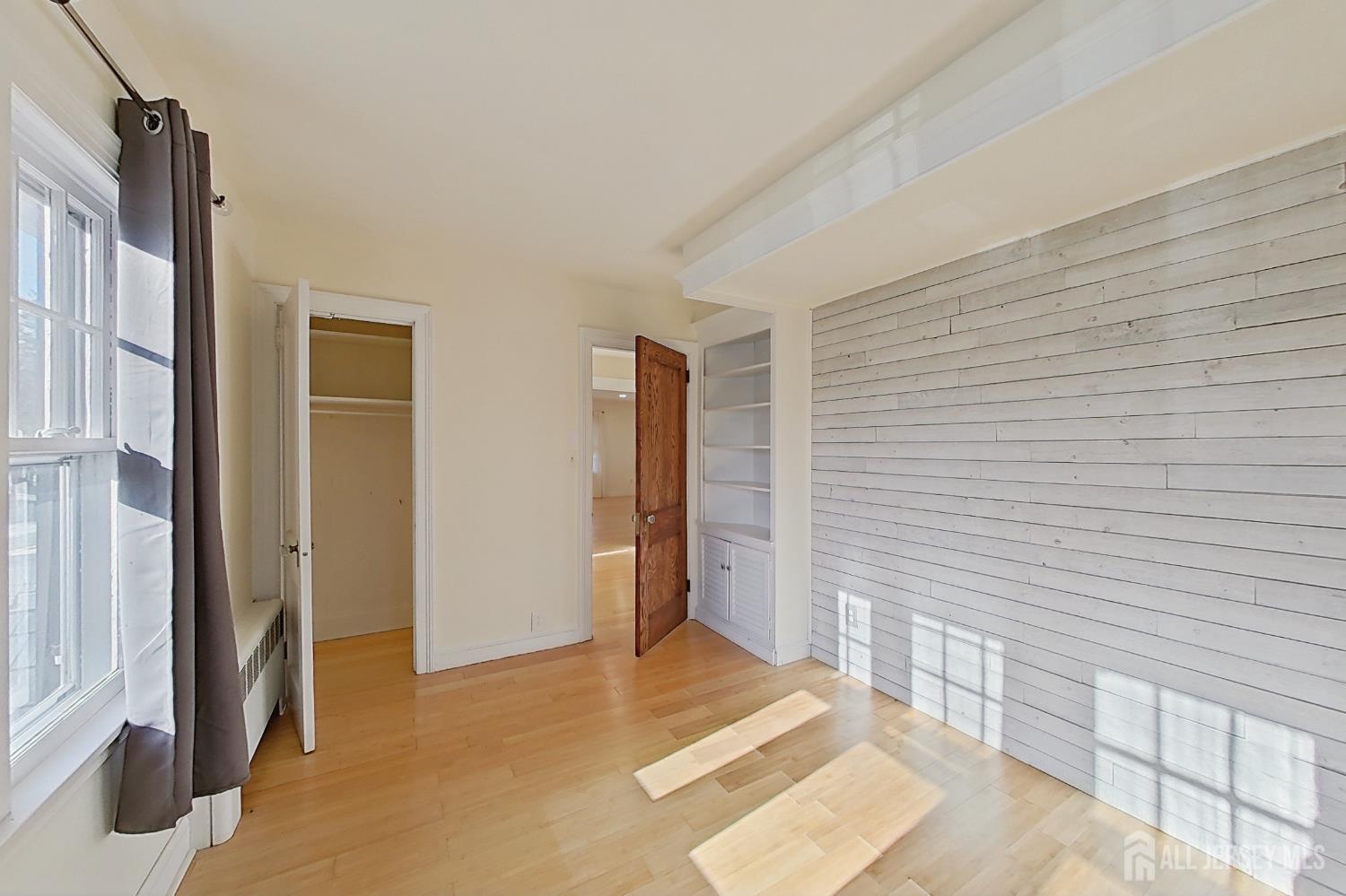 205 Ashland Road Middlesex, NJ 08846 - Photo 28 of 48 a view of livingroom with hardwood floor and staircase