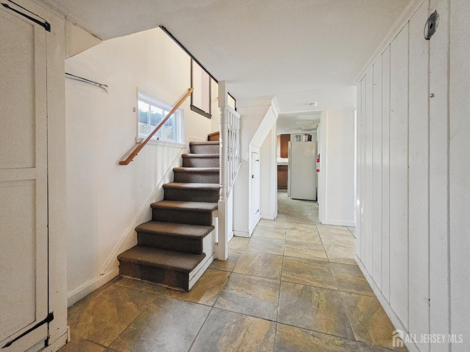 205 Ashland Road Middlesex, NJ 08846 - Photo 41 of 48 a view of entryway and gallery with wooden floor
