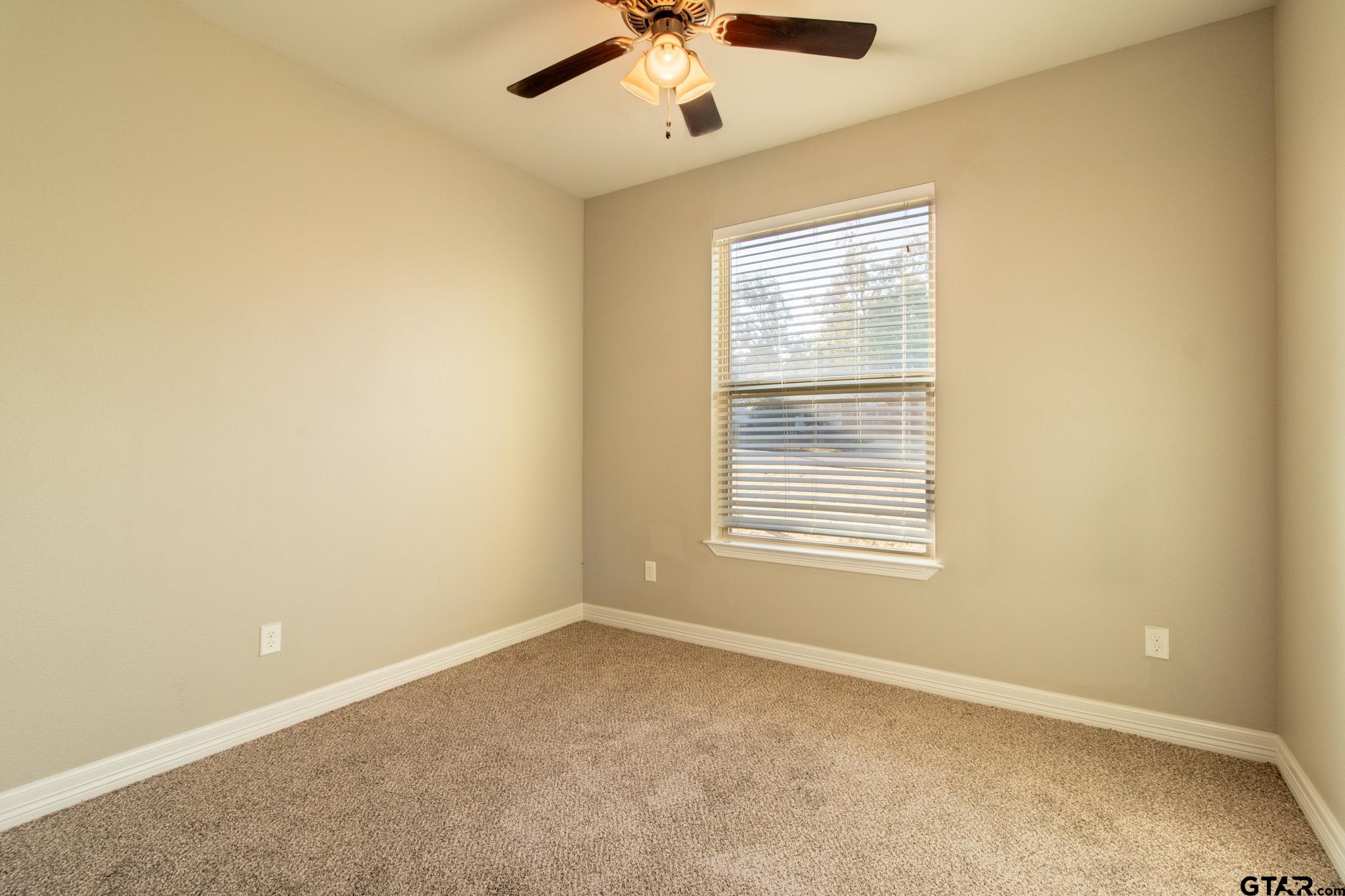 2806 Valley View Street Tyler, TX 75701 - Photo 18 of 22 a view of an empty room with a window