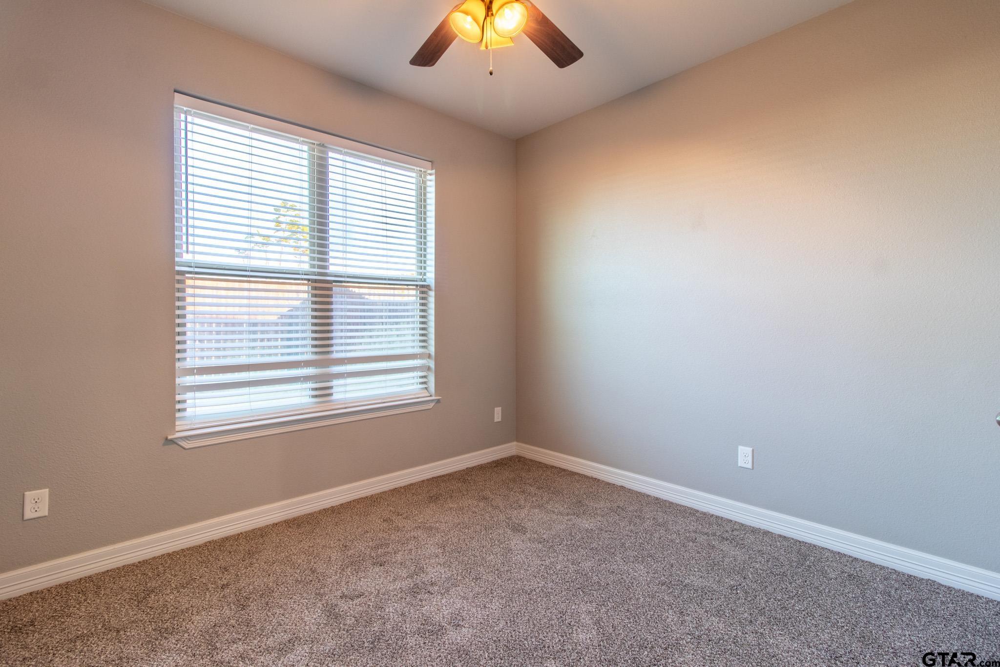2806 Valley View Street Tyler, TX 75701 - Photo 21 of 22 an empty room with a window