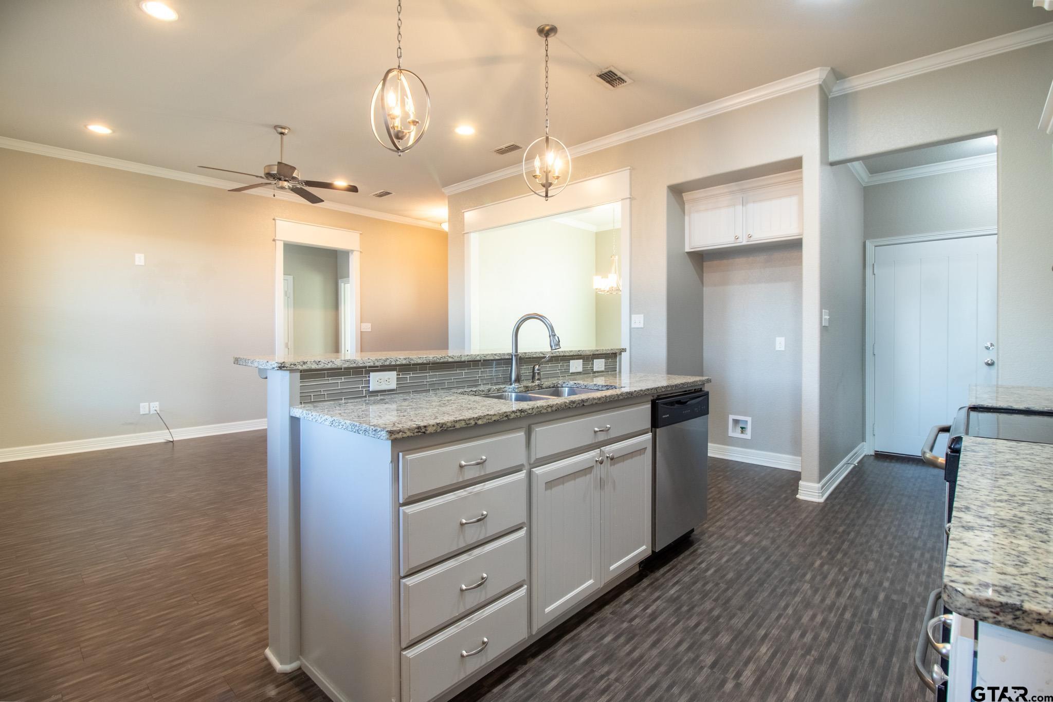 2806 Valley View Street Tyler, TX 75701 - Photo 10 of 22 a bathroom with a granite countertop sink and a mirror