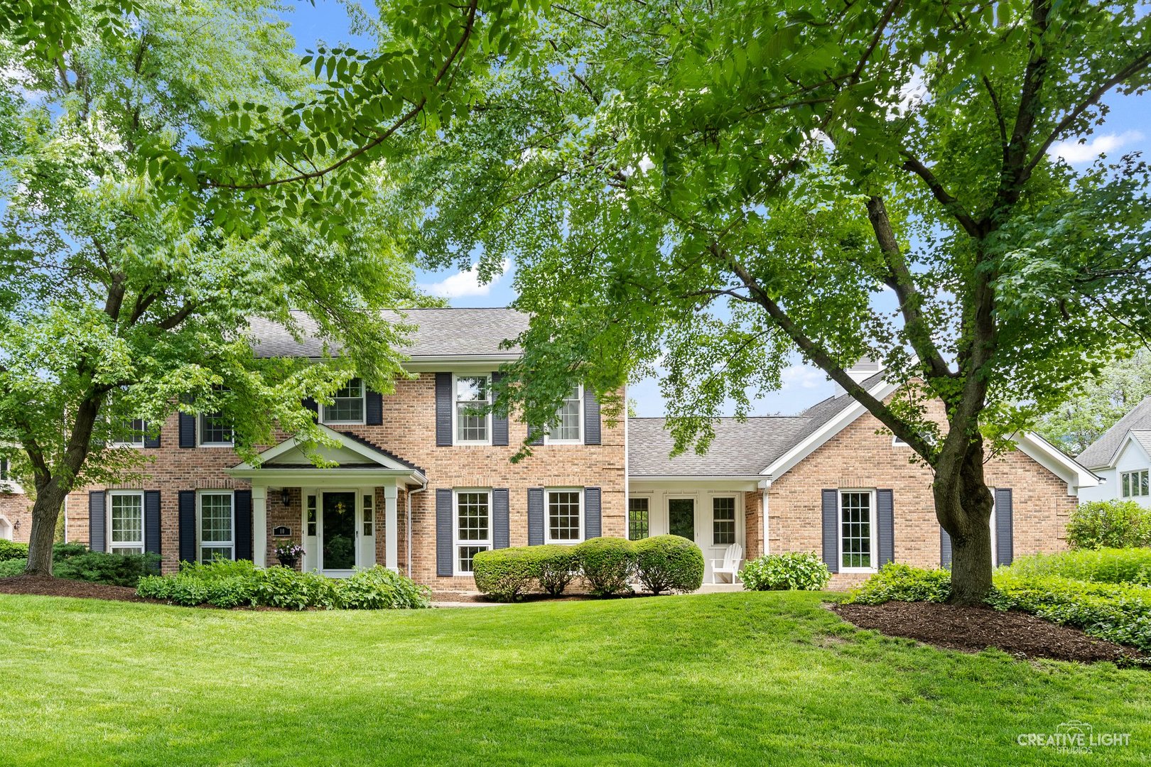 10 Aintree Road St. Charles, IL 60174 - Photo 1 of 34 a front view of a house with a garden