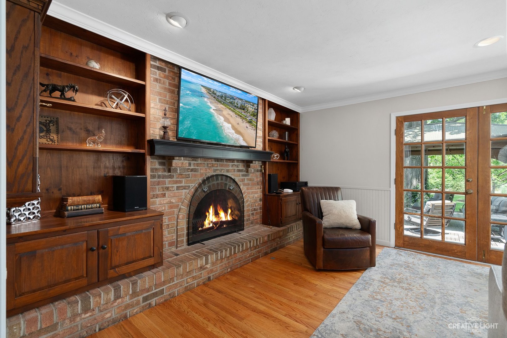 10 Aintree Road St. Charles, IL 60174 - Photo 7 of 34 a living room with furniture and a fireplace
