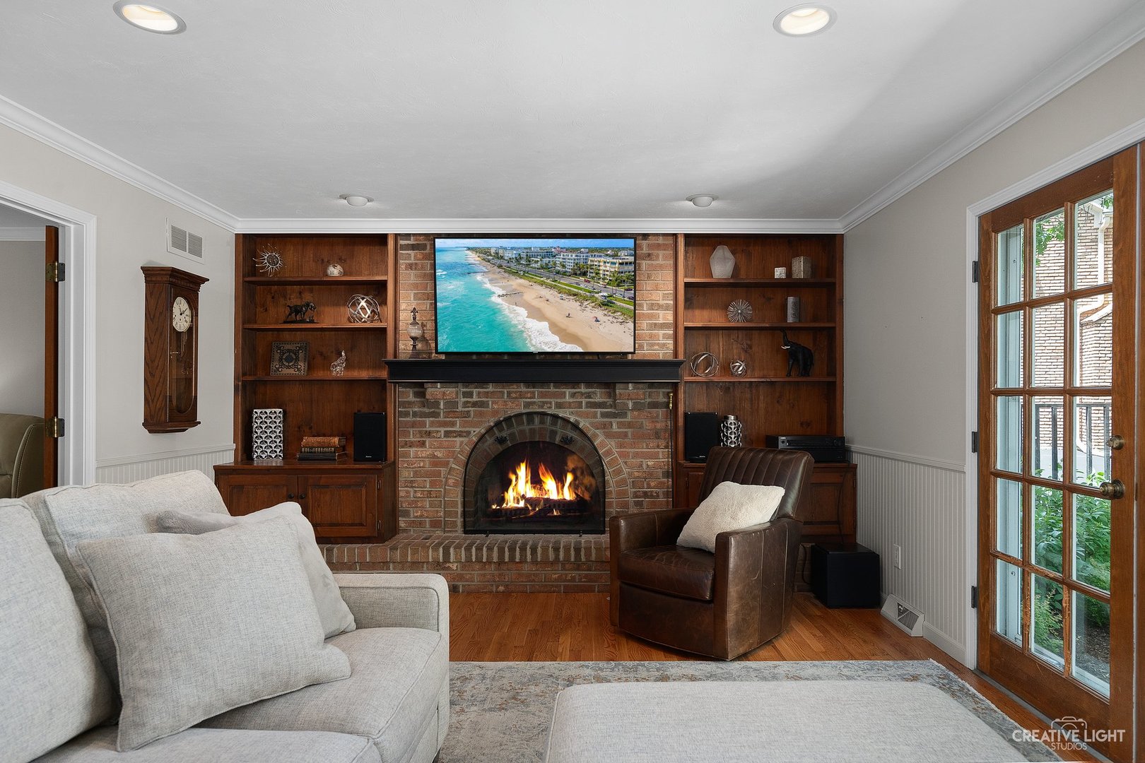 10 Aintree Road St. Charles, IL 60174 - Photo 8 of 34 a living room with furniture and a fireplace