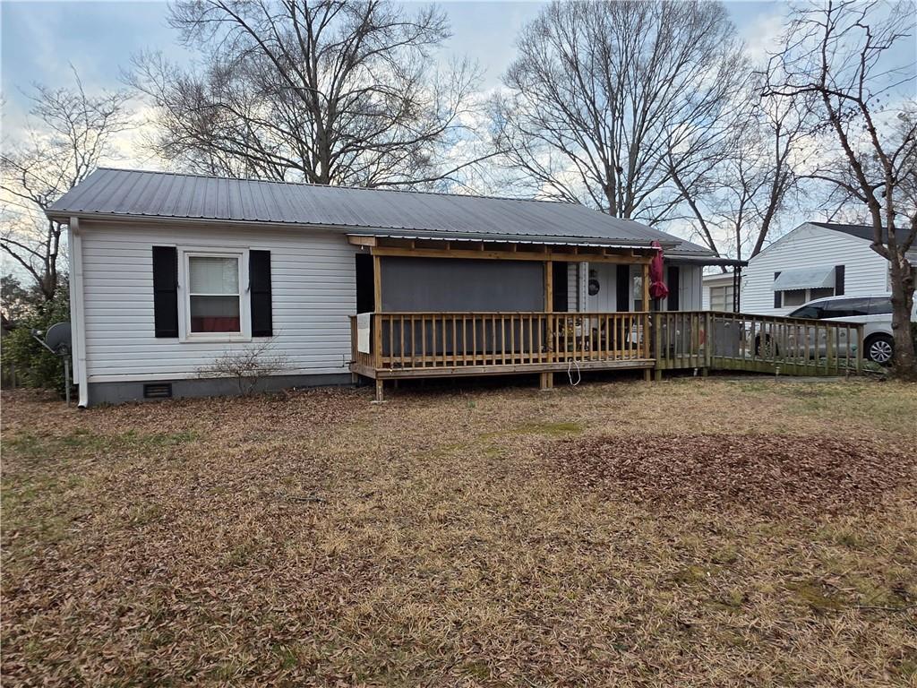 421 Spruce Street Cedartown, GA 30125 - Photo 1 of 3 a front view of a house with a yard