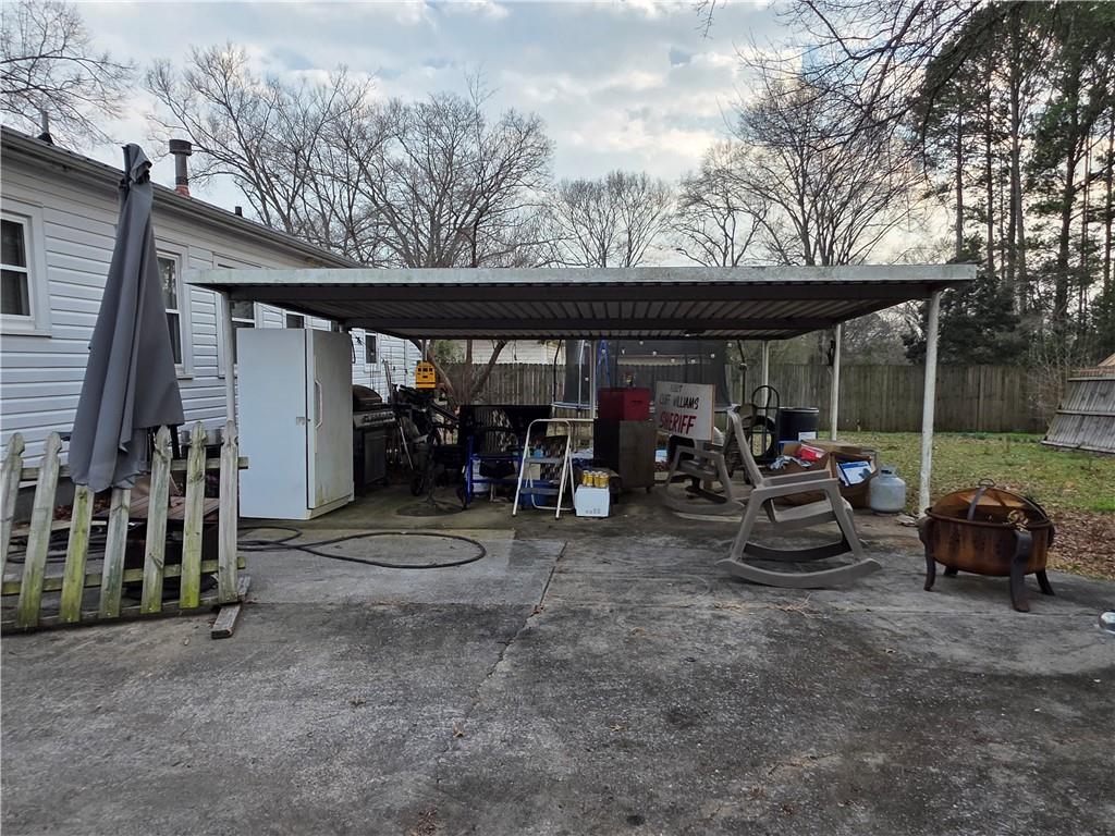 421 Spruce Street Cedartown, GA 30125 - Photo 2 of 3 a view of car parked in garage