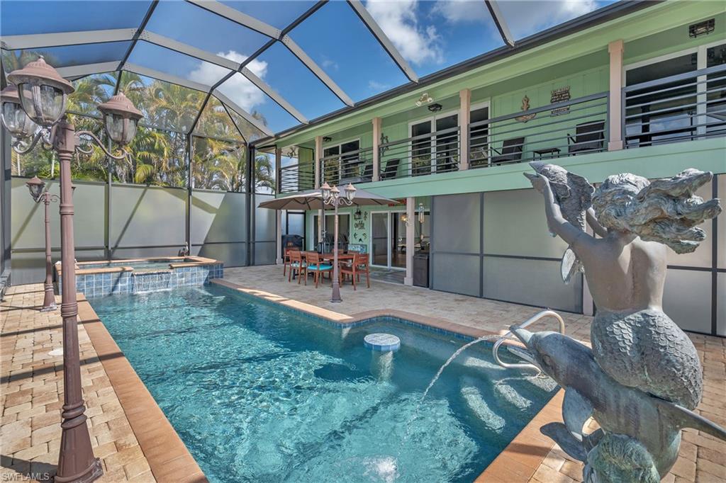 3001 50th Street Southwest Naples, FL 34116 - Photo 31 of 46 a view of a house with backyard