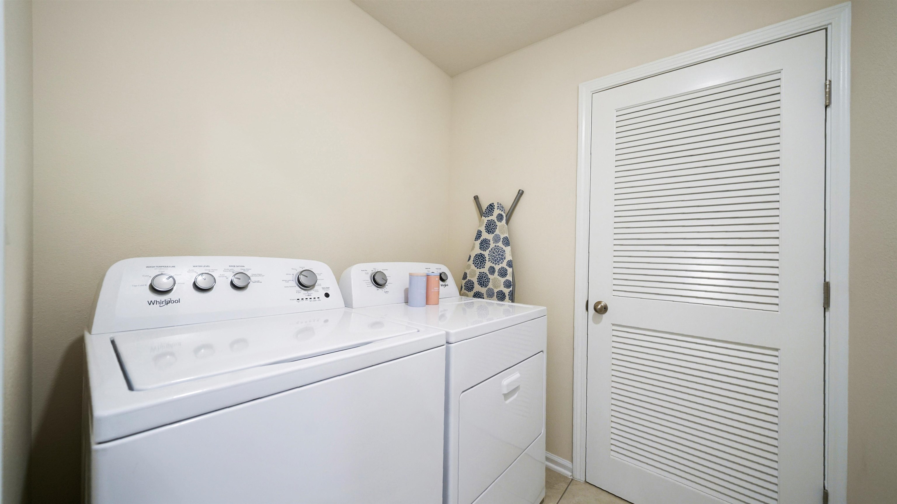 194 Redbud Road Palm Coast, FL 32137 - Photo 21 of 34 a utility room with dryer and washer