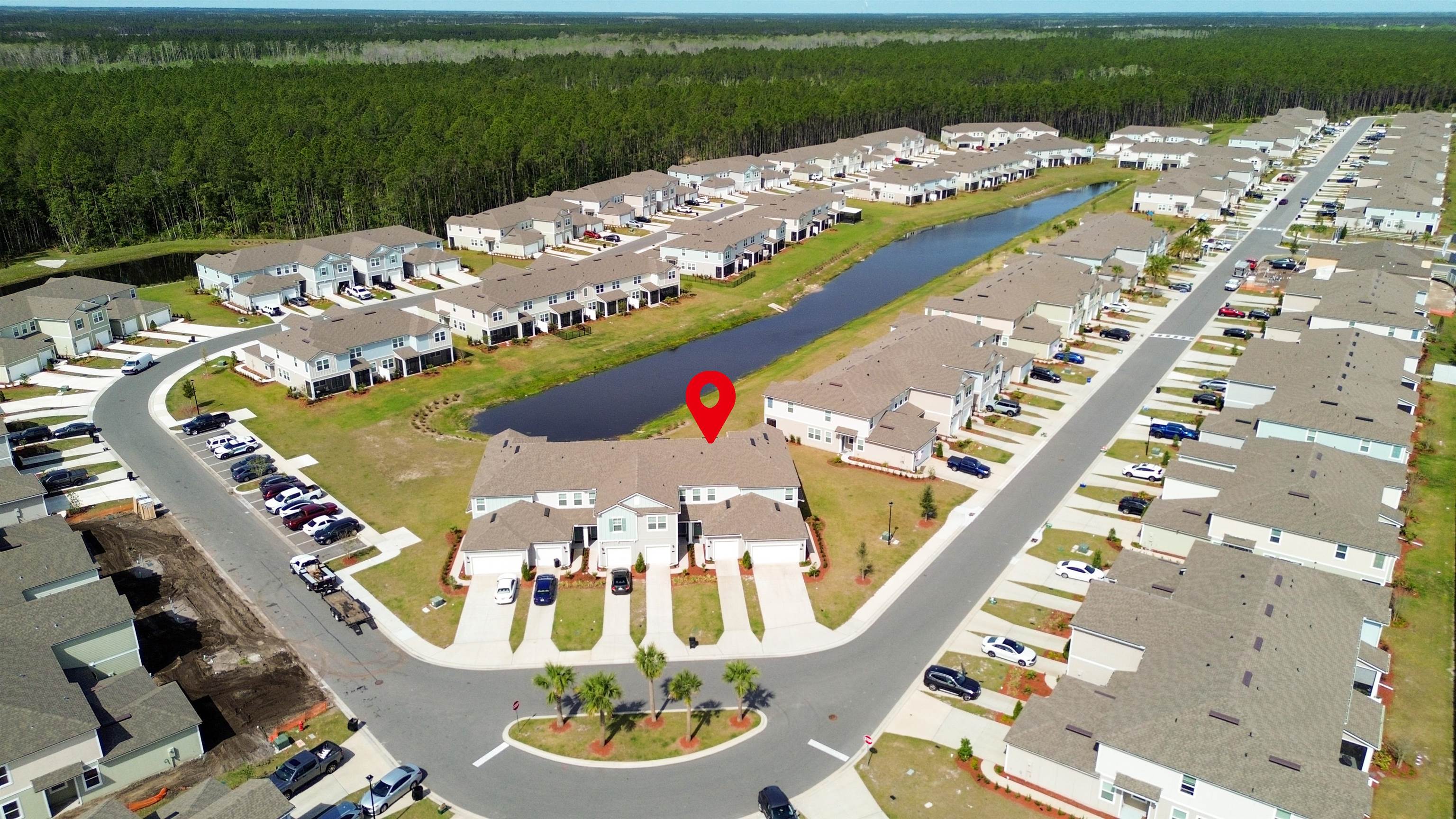 194 Redbud Road Palm Coast, FL 32137 - Photo 25 of 34 an aerial view of a dining tables and chairs in patio