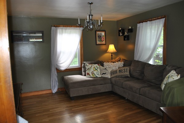 124 Partridgeville Road Templeton, MA 01468 - Photo 8 of 30 a living room with furniture and a chandelier