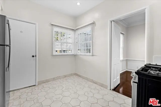 a view of a utility room with windows