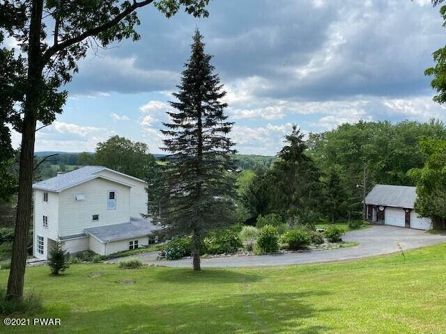 93 Miller Road Beach Lake, PA 18405 - Photo 2 of 53 a view of a backyard with garden