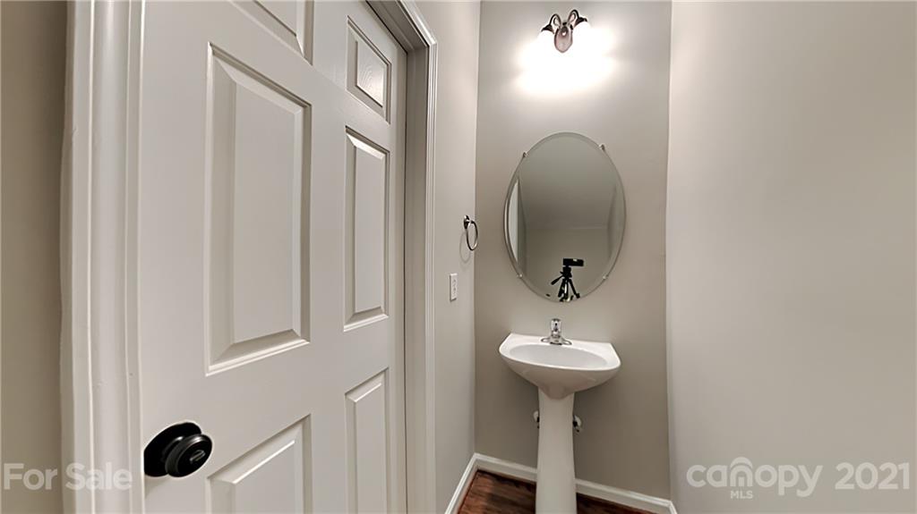 180 Snead Road Fort Mill, SC 29715 - Photo 8 of 15 a bathroom with a sink and a mirror