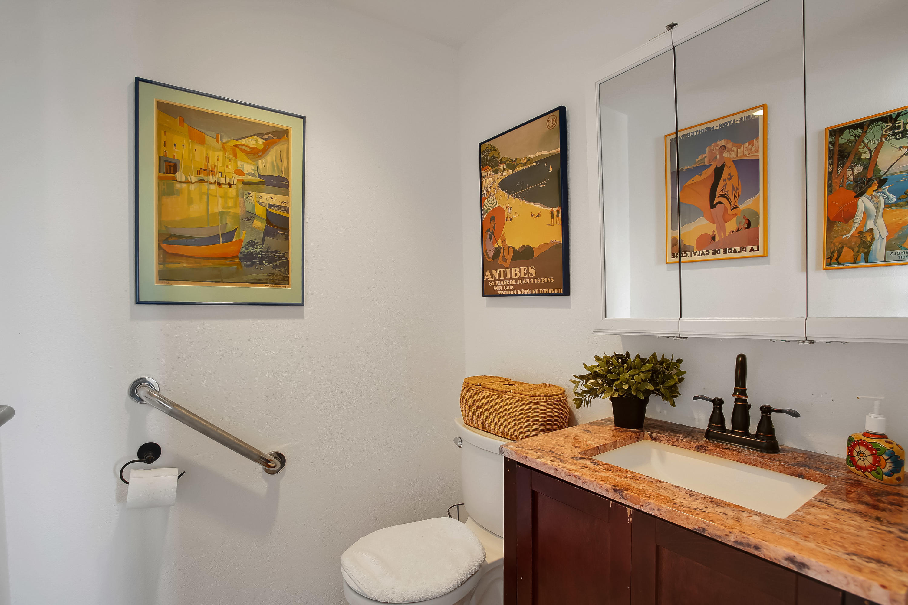 435 Fellowship Road Santa Barbara, CA 93109 - Photo 12 of 47 a bathroom with a granite countertop sink and a mirror