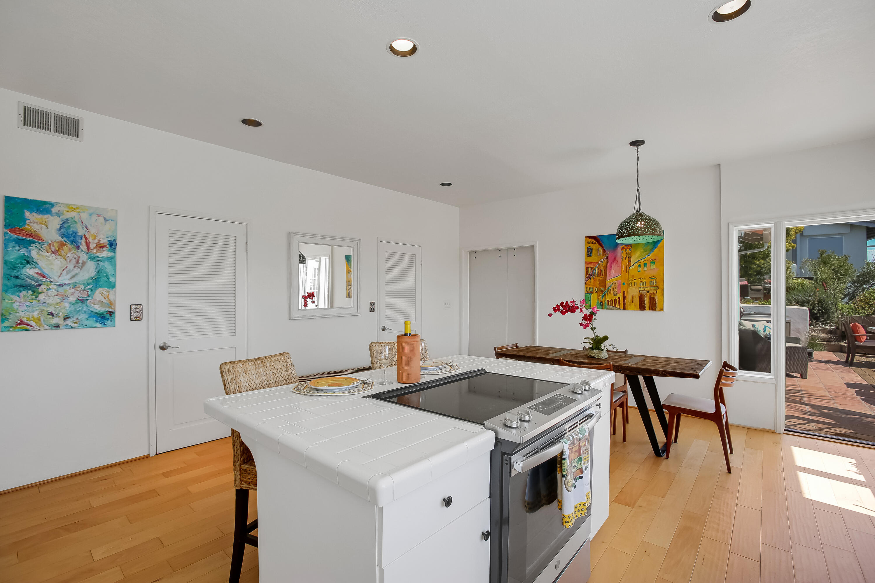 435 Fellowship Road Santa Barbara, CA 93109 - Photo 17 of 47 a view of kitchen island with furniture and wooden floor