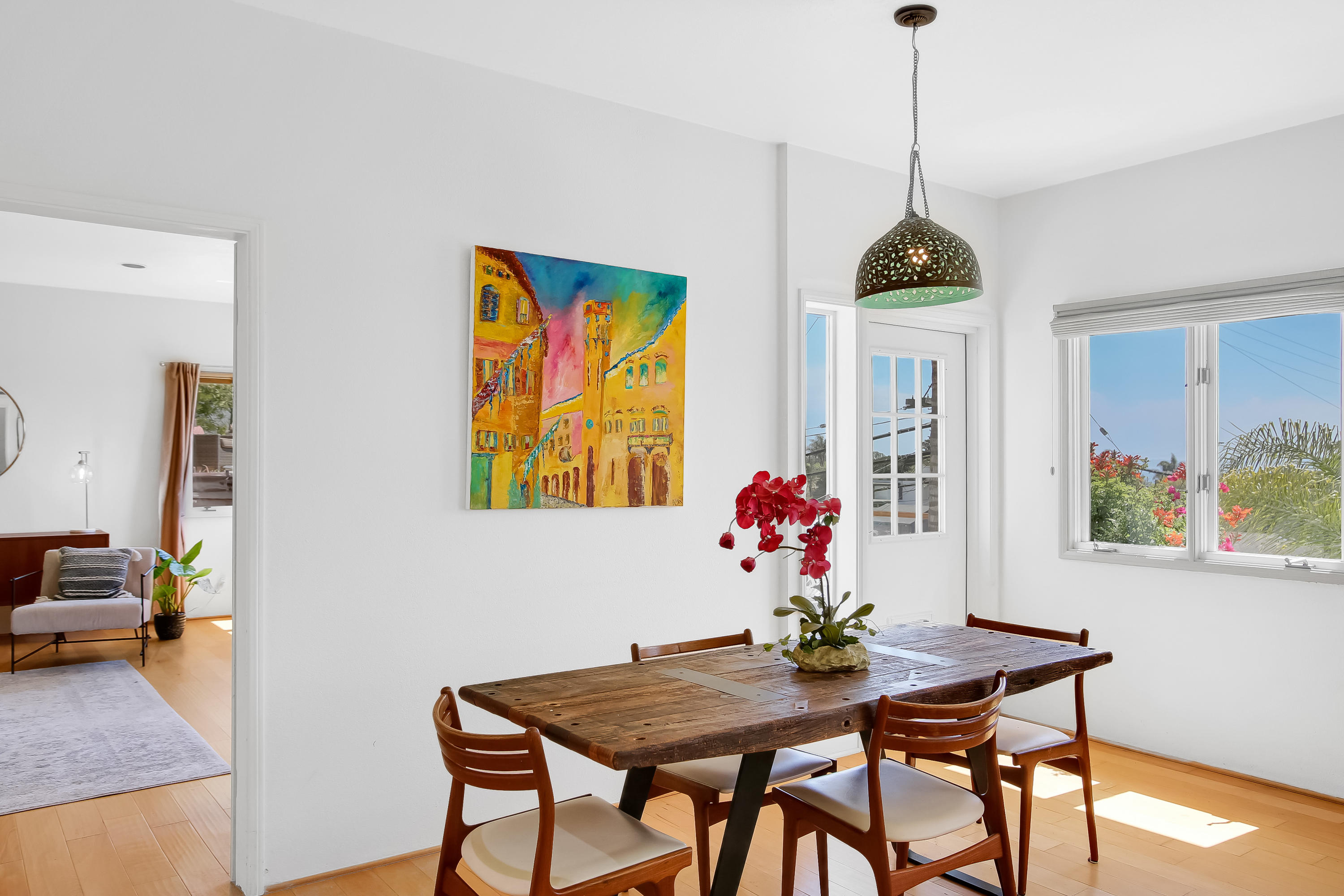 435 Fellowship Road Santa Barbara, CA 93109 - Photo 18 of 47 a view of a dining room with furniture wooden floor and a chandelier