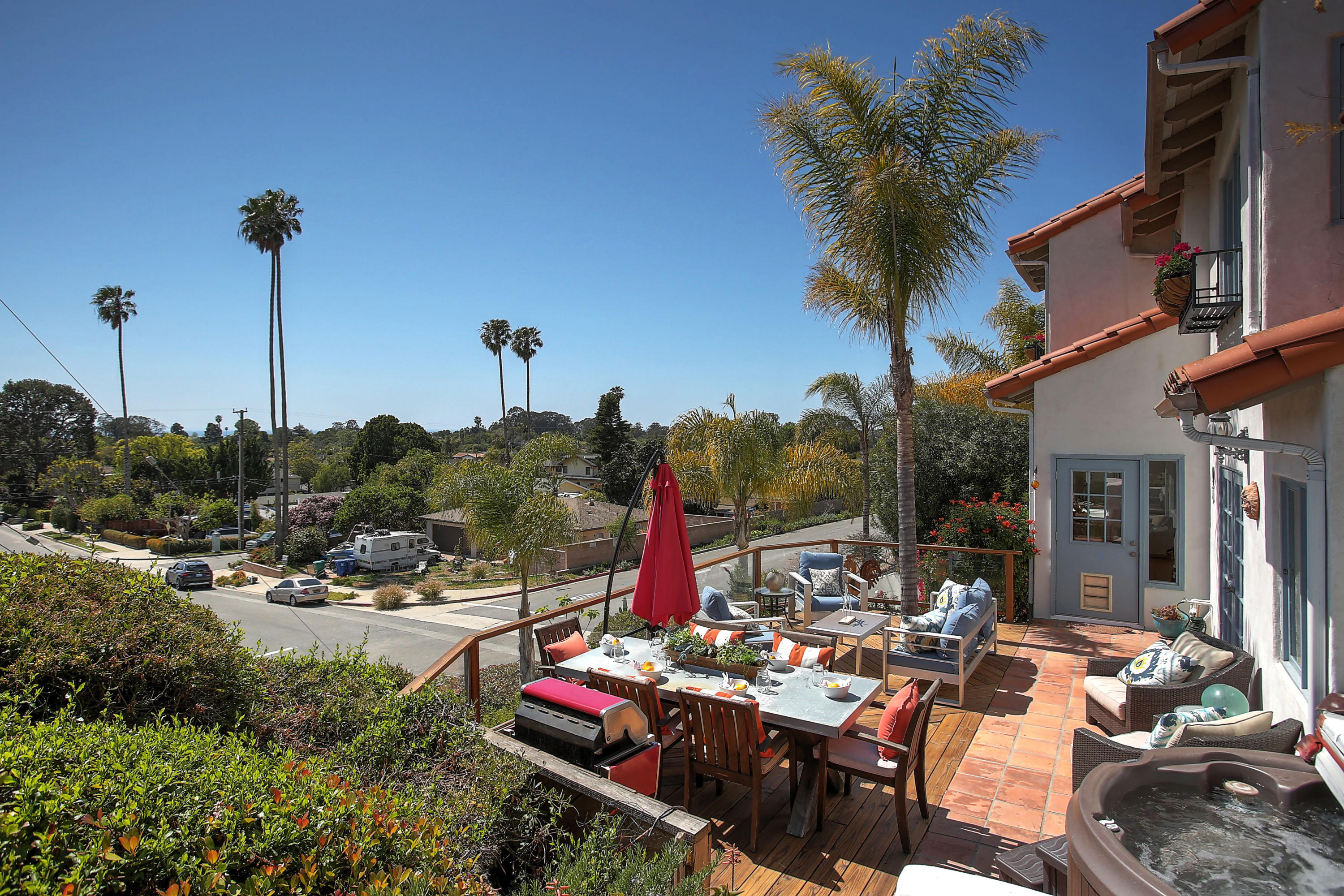 435 Fellowship Road Santa Barbara, CA 93109 - Photo 23 of 47 a view of a terrace with a table and chairs