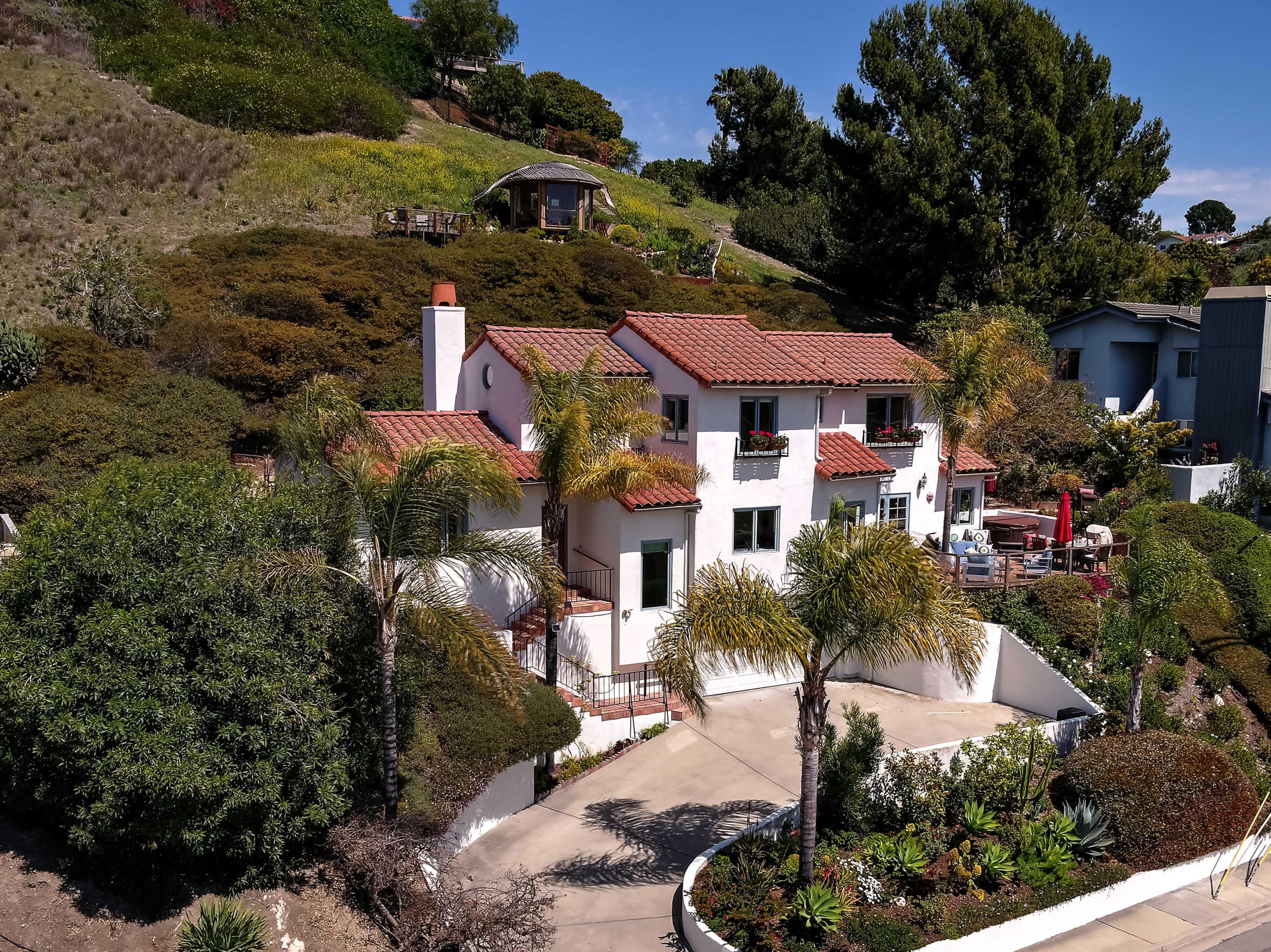 435 Fellowship Road Santa Barbara, CA 93109 - Photo 3 of 47 a view of a house with a yard and garden