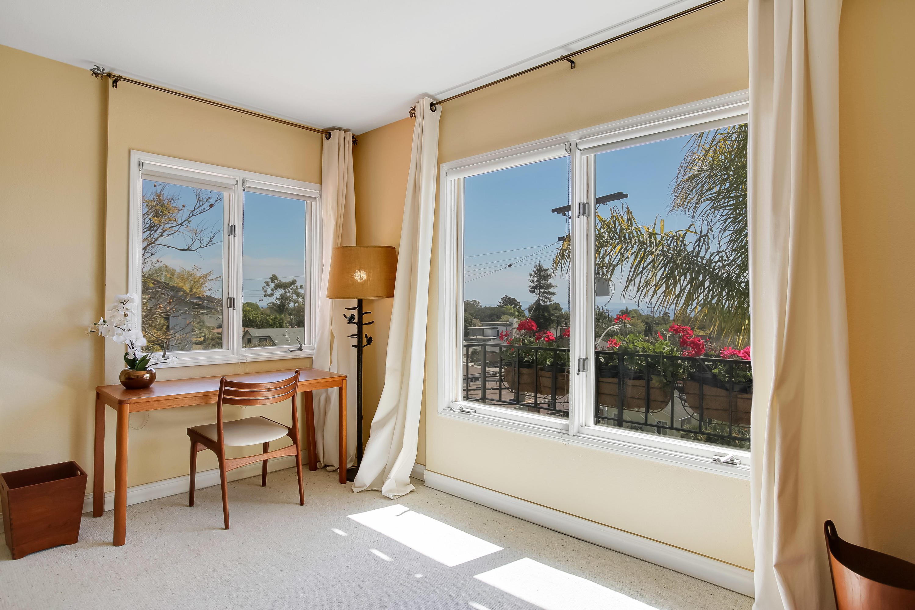 435 Fellowship Road Santa Barbara, CA 93109 - Photo 33 of 47 a view of a room with a large window and wooden floor