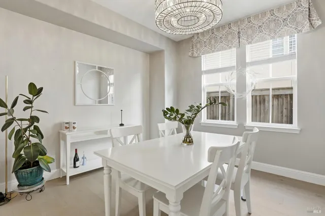 a view of a dining room with furniture