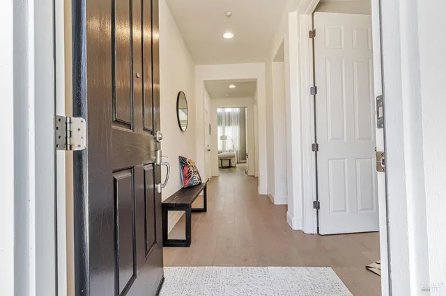 a view of a hallway with windows