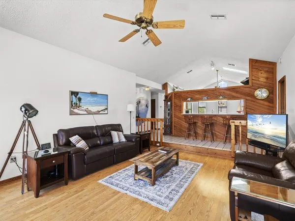 a view of a lake with a house in the background