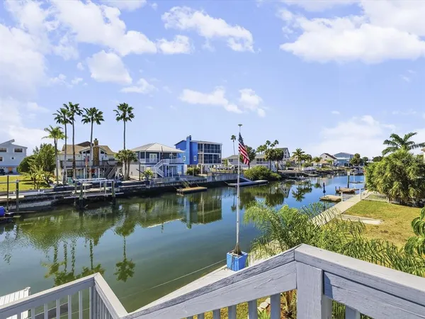 a kitchen with stainless steel appliances granite countertop a stove sink and cabinets
