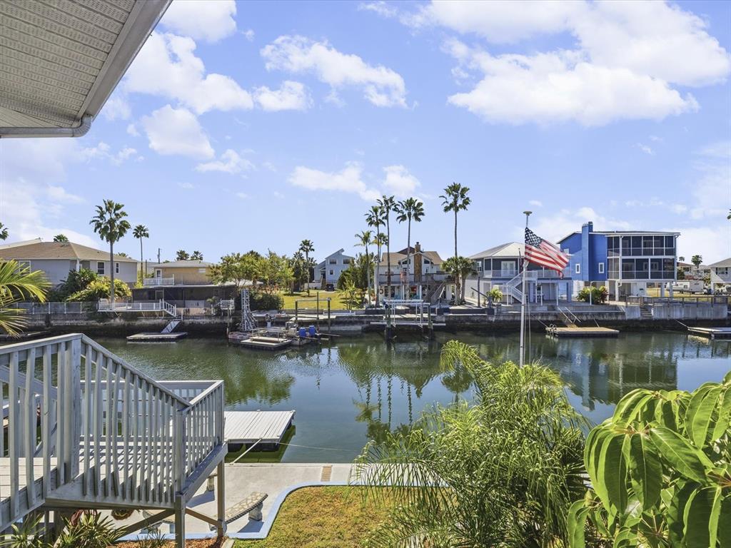 4290 Carlos Court Hernando Beach, FL 34607 - Photo 36 of 96 a view of a lake with boats and a bridge