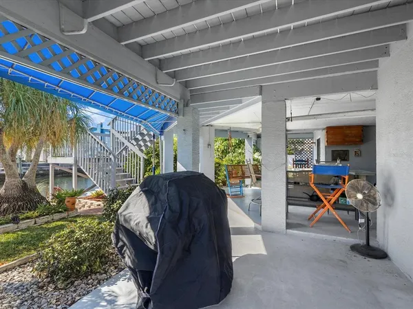 a view of a bench in a backyard