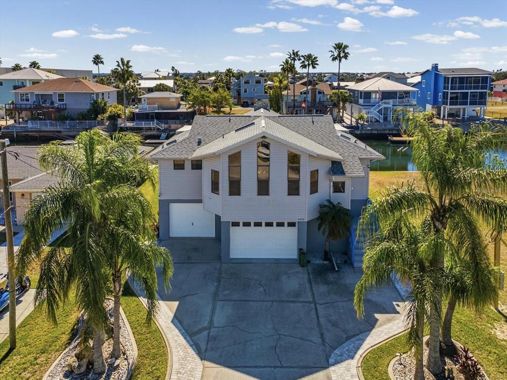 4290 Carlos Court Hernando Beach, FL 34607 - Photo 51 of 96 a large building with a clock tower in the middle